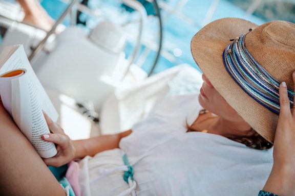 Reading on luxury yacht